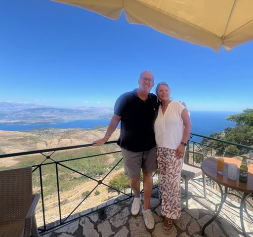 Olive & Stone's founders on a Corfu terrace overlooking the Ionian Sea